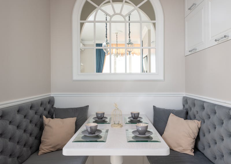 Intimate private dining nook with cozy decor